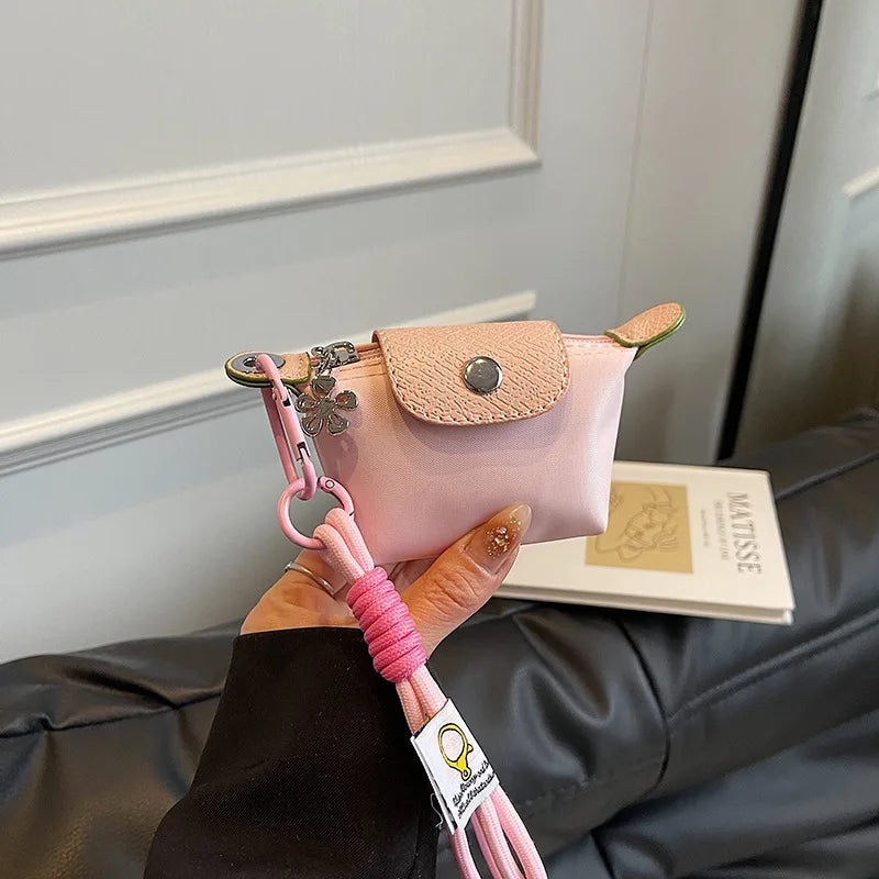 Monedero con pulsera de muñeca y llavero