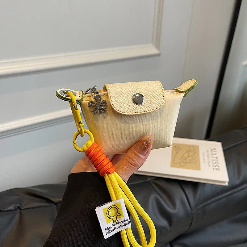 Monedero con pulsera de muñeca y llavero