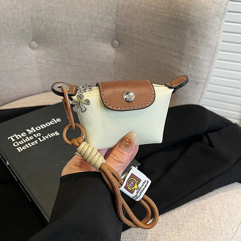 Monedero con pulsera de muñeca y llavero