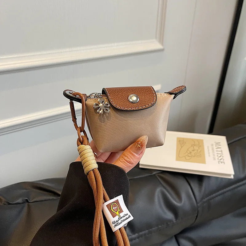 Monedero con pulsera de muñeca y llavero