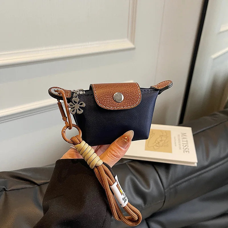 Monedero con pulsera de muñeca y llavero