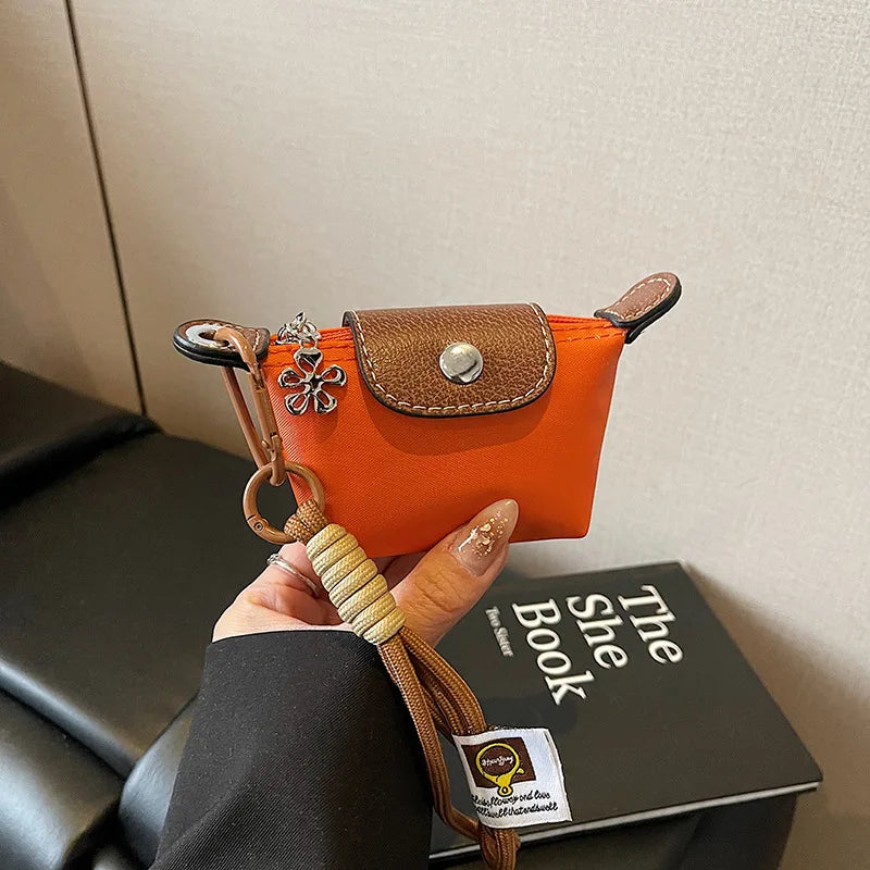 Monedero con pulsera de muñeca y llavero