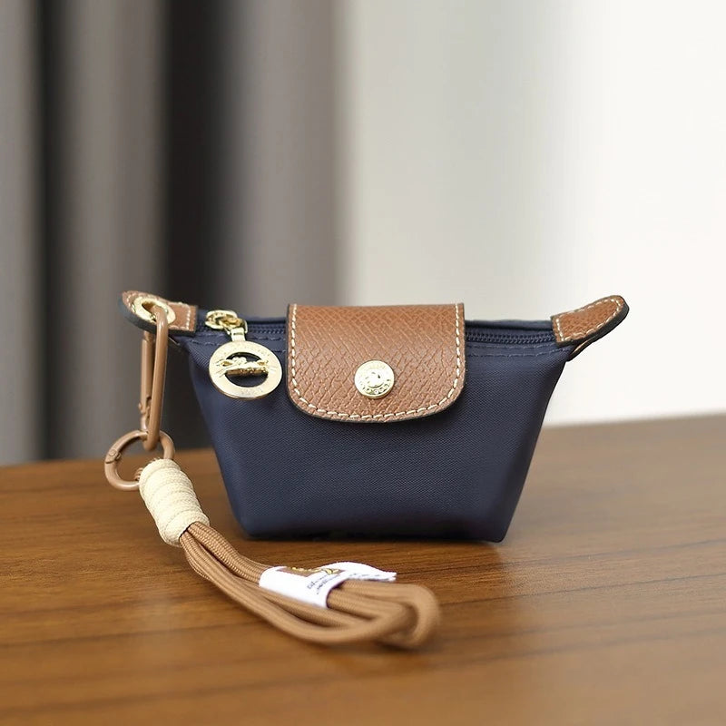 Monedero con pulsera de muñeca y llavero